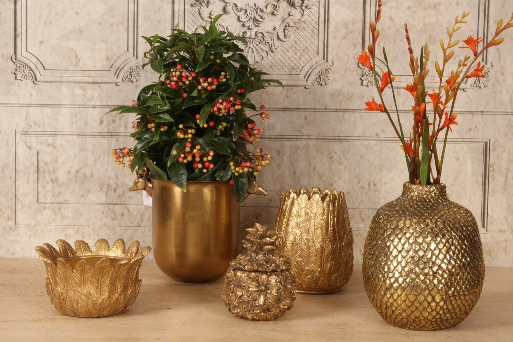Opbevaringsboks med blomster - 12,5 cm - guld - kunstharpiks